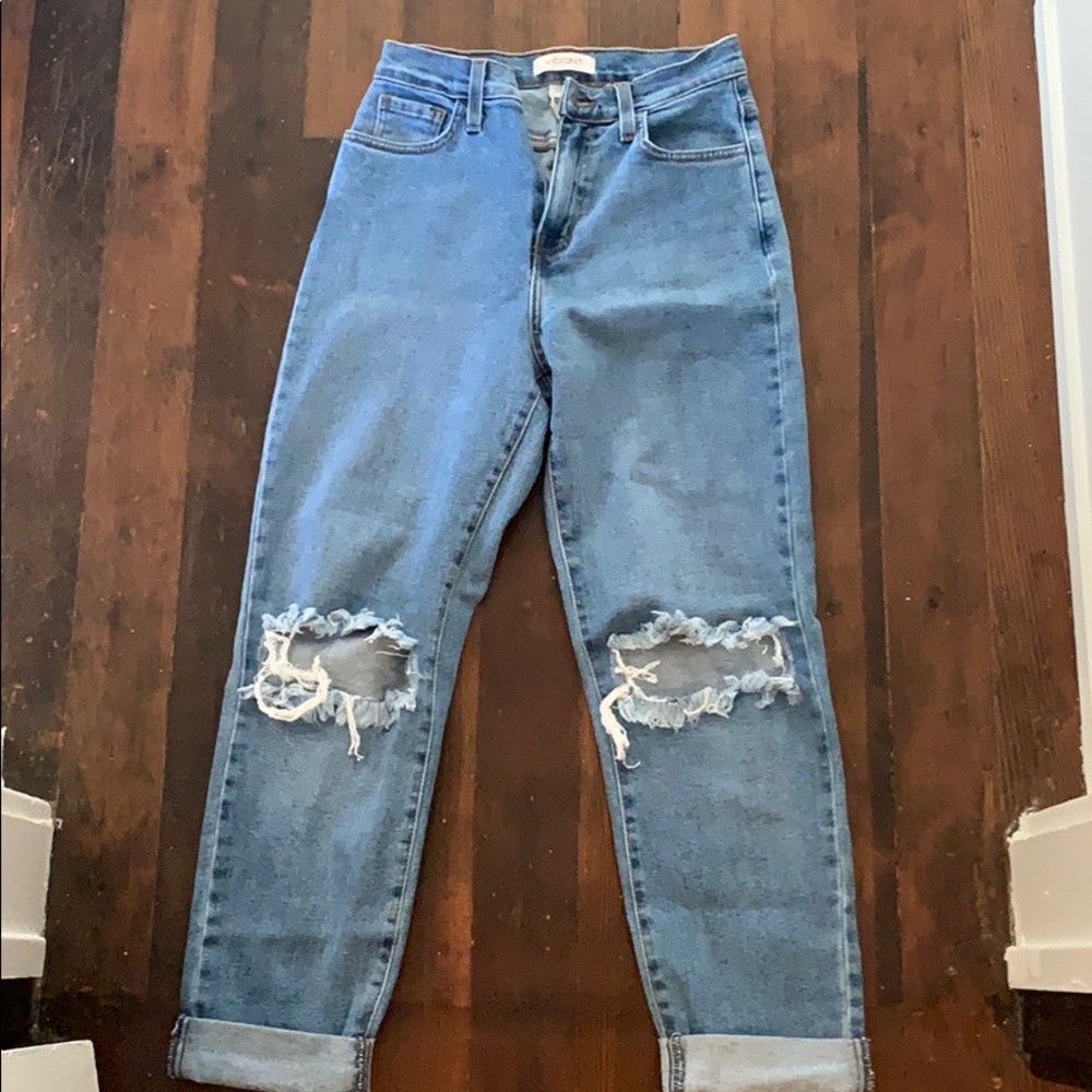 Vibrant blue knee ripped mom jeans